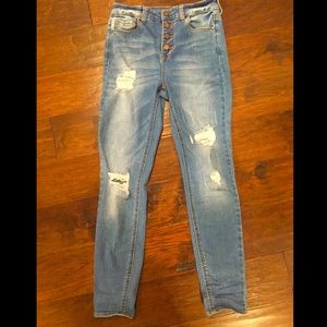 mild blue ripped skinny jeans